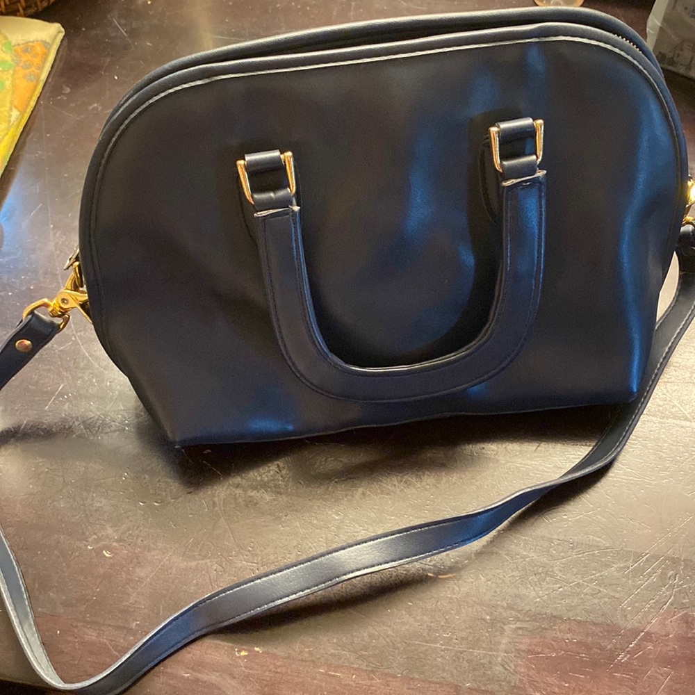 Vintage Coach bag navy blue leather exterior, suede interior.